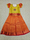 Golden yellow and red bridal silk pattu pavadai for kids with puff sleeves and stone embroidery – Sri Thulir Tex South Indian traditional kids wear