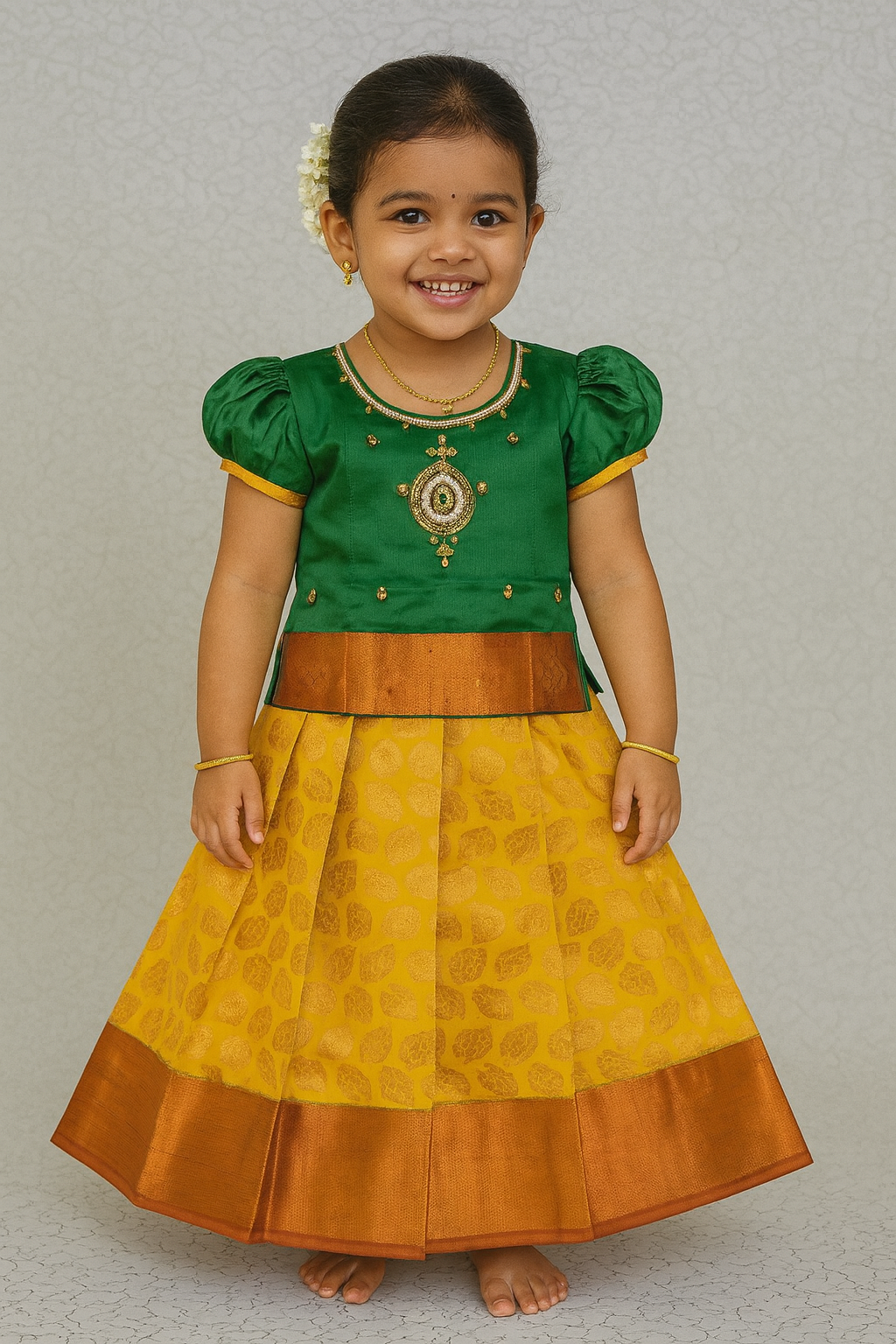 Green and mustard yellow silk pattu pavadai for girls with designer stone work blouse and zari leaf-patterned skirt – Sri Thulir Tex