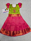 Kids green and pink pattu pavadai set with puff sleeve blouse and zari silk skirt from Sri Thulir Tex