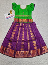 Kids Pattu Pavadai set with green top and purple zari woven skirt from Sri Thulir Tex.