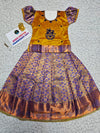 Kids pattu pavadai set with mustard yellow top and purple bridal silk skirt from Sri Thulir Tex