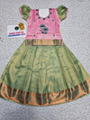 Kids pattu pavadai set with pink top and green silk skirt from Sri Thulir Tex