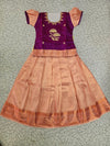 Kids purple and peach pattu pavadai set with puff sleeves and zari silk skirt from Sri Thulir Tex