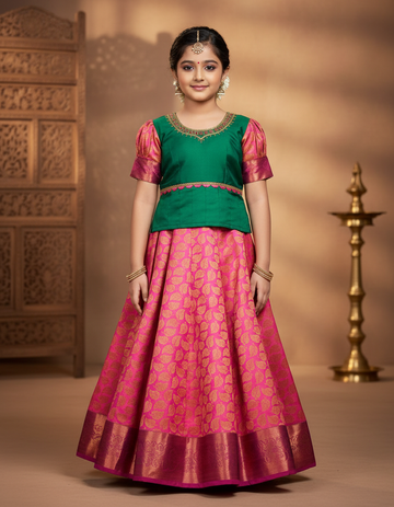 Kids green and pink pattu pavadai set with silk skirt and embroidered stonework blouse
