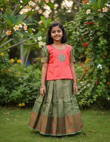 Kids pattu pavadai set with pink semi silk top and green bridal silk skirt by Sri Thulir Tex