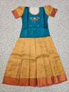Kids pattu pavadai set with teal blue semi silk top and cream bridal silk skirt by Sri Thulir Tex