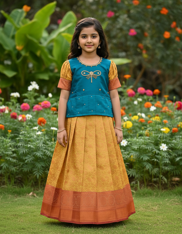 Kids pattu pavadai set with teal blue semi silk top and cream bridal silk skirt by Sri Thulir Tex