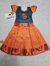 Kids teal blue and orange pattu pavadai set with puff sleeve blouse and zari silk skirt from Sri Thulir Tex