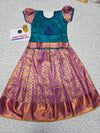 Kids pattu pavadai set with teal green top and purple bridal silk skirt from Sri Thulir Tex