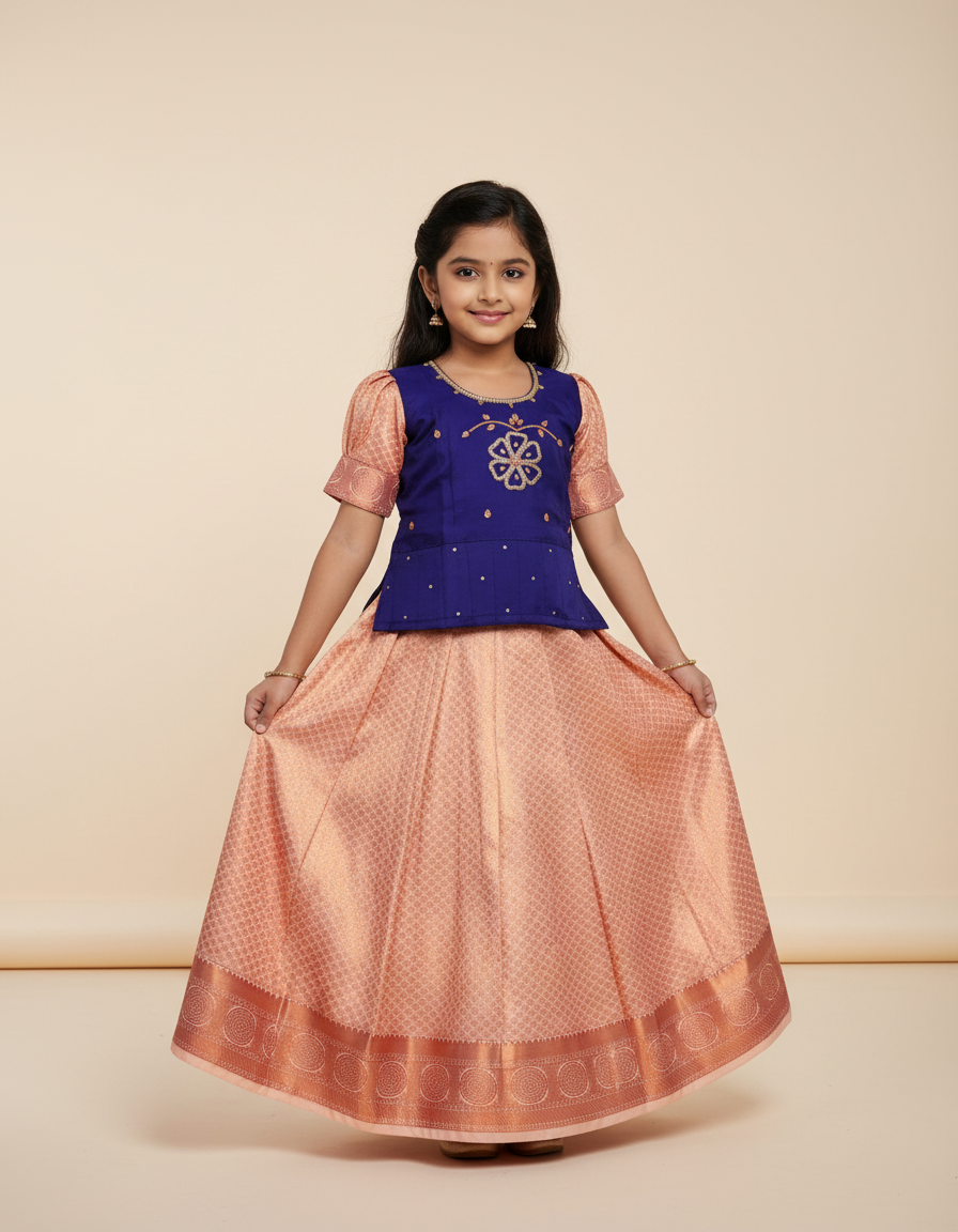 Kids Pattu Pavadai set with violet stone-work top and peach zari woven skirt from Sri Thulir Tex.