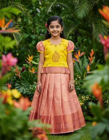 Kids yellow and peach pattu pavadai set with puff sleeve blouse and zari silk skirt from Sri Thulir Tex