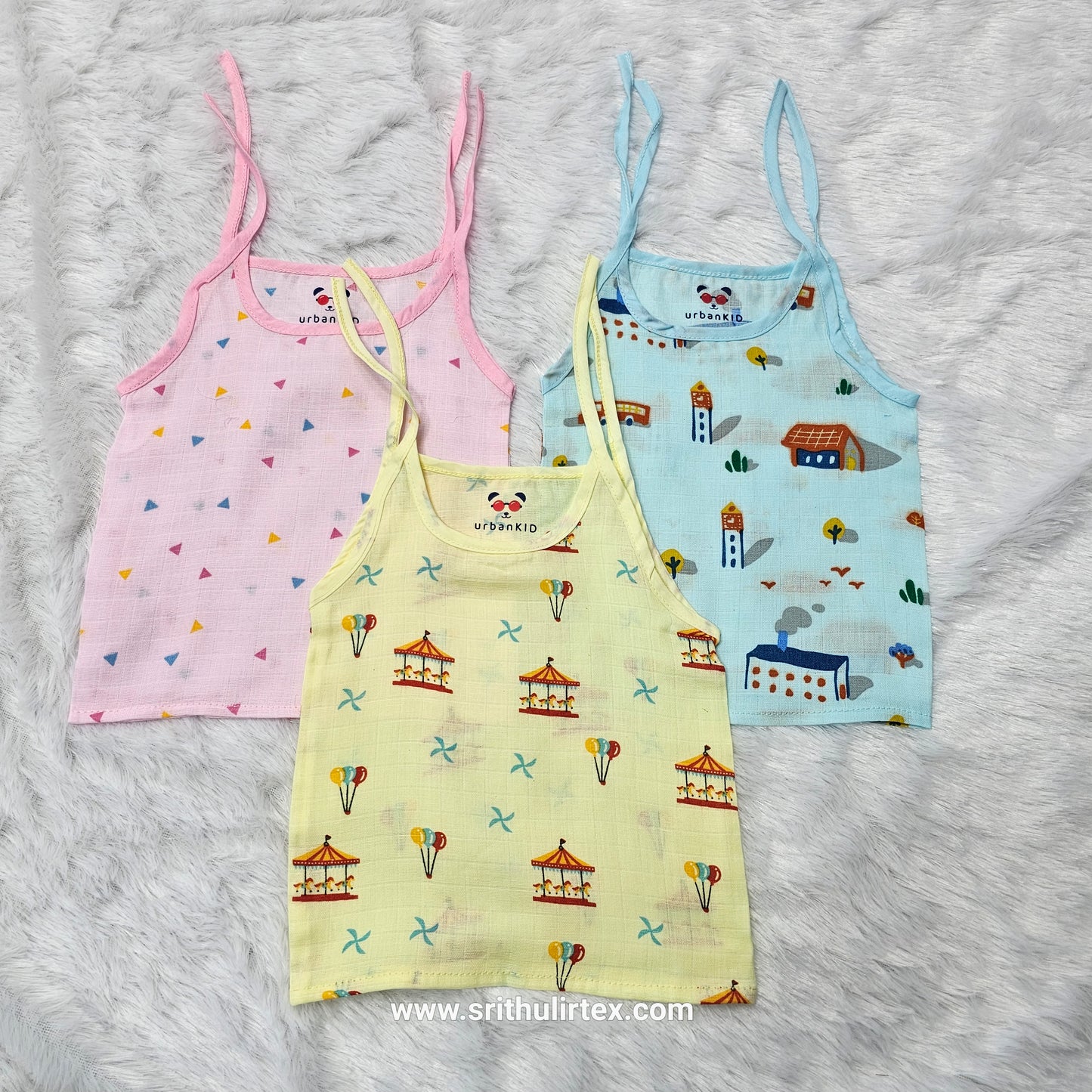 Pack of 3 newborn muslin rope type jabla tops in yellow, peach, and blue with multi printed designs.