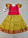 Pink and green kids pattu pavadai set with puff sleeves and bridal silk skirt by Sri Thulir Tex