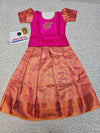 Pink and peach kids pattu pavadai set with puff sleeves and bridal silk skirt by Sri Thulir Tex