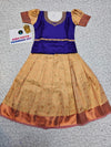 Purple and cream kids pattu pavadai set with puff sleeves and bridal silk skirt by Sri Thulir Tex