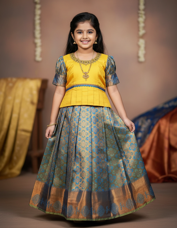 Yellow and blue kids pattu pavadai set with puff sleeves and zari bridal silk skirt by Sri Thulir Tex