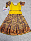 Yellow and purple kids pattu pavadai set with puff sleeves and bridal silk skirt by Sri Thulir Tex