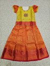 Yellow and red bridal silk pattu pavadai for kids with puff sleeves and stone work embroidery – Sri Thulir Tex South Indian traditional wear