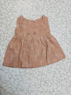 Baby muslin jabla frock in brown color with white multi print and button design for 0–6 months.