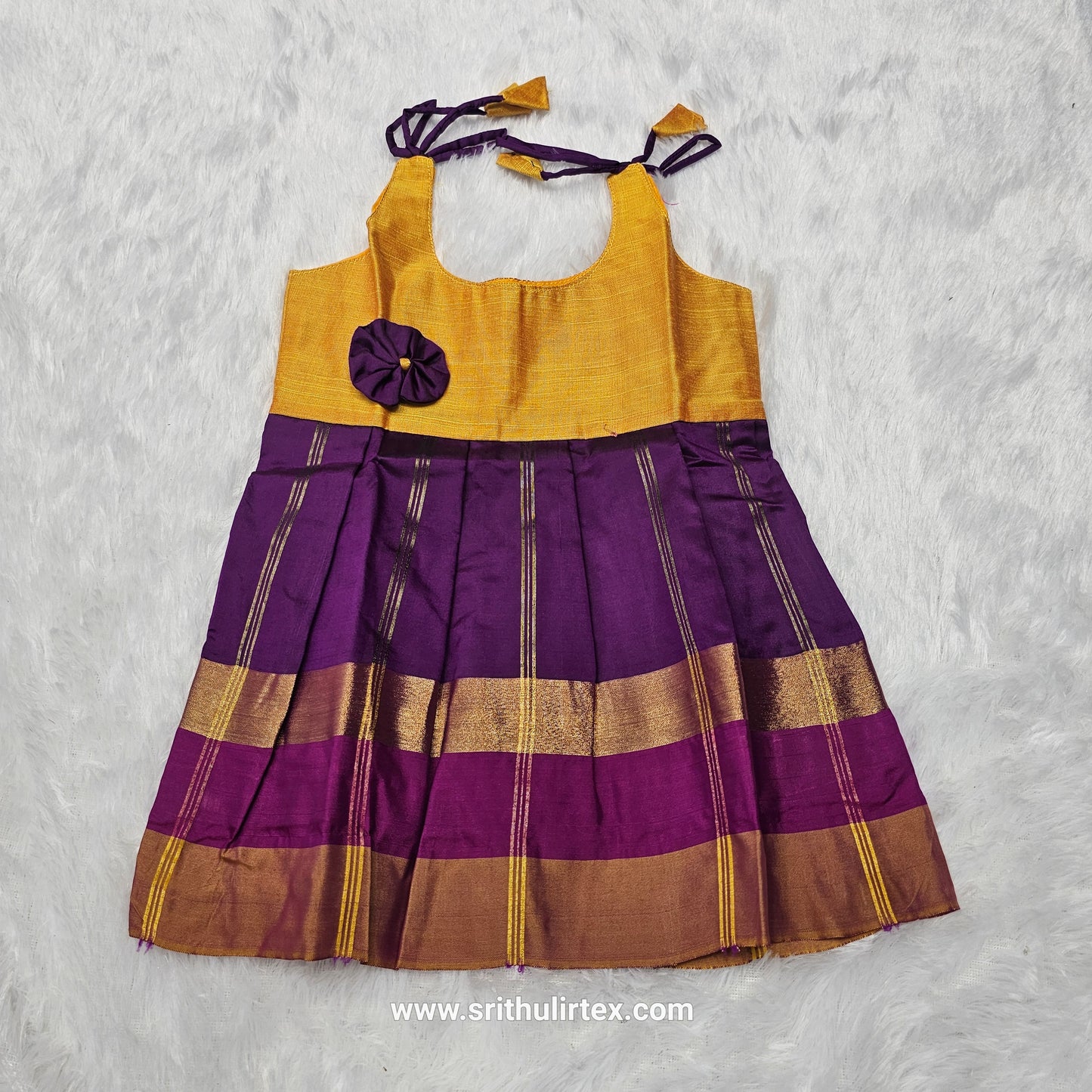 Pink top with green multicolour border silk baby frock by Sri Thulir Tex