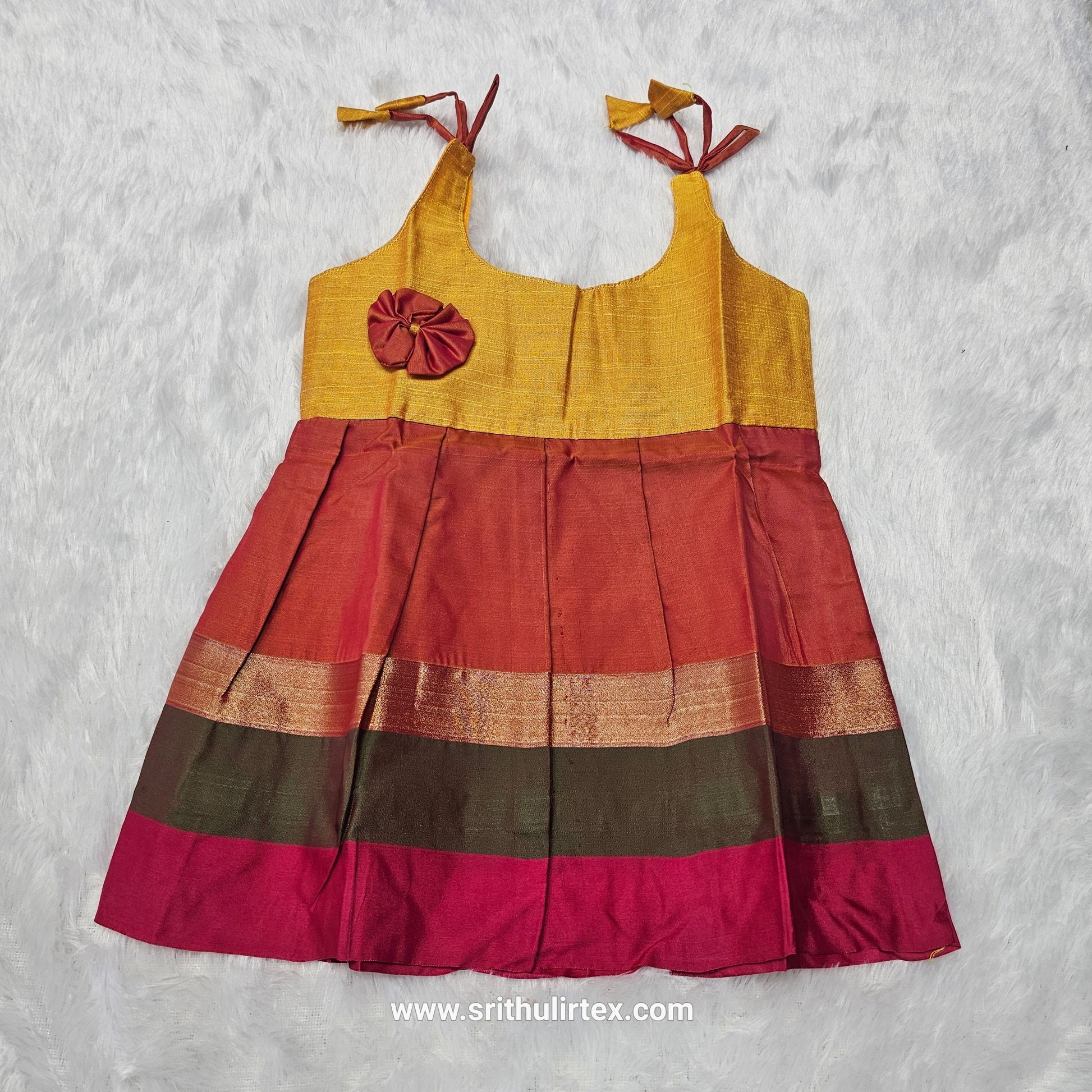 Pink top with green multicolour border silk baby frock by Sri Thulir Tex