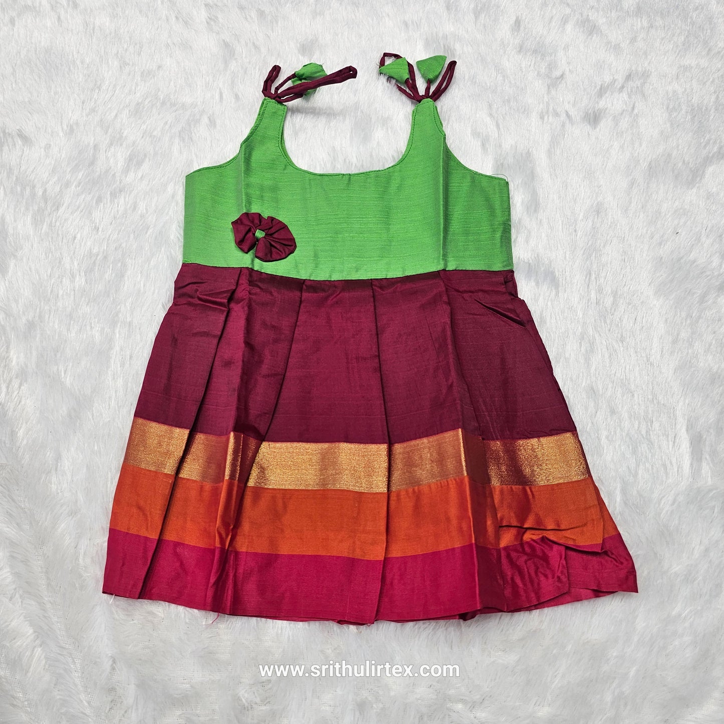 Pink top with green multicolour border silk baby frock by Sri Thulir Tex