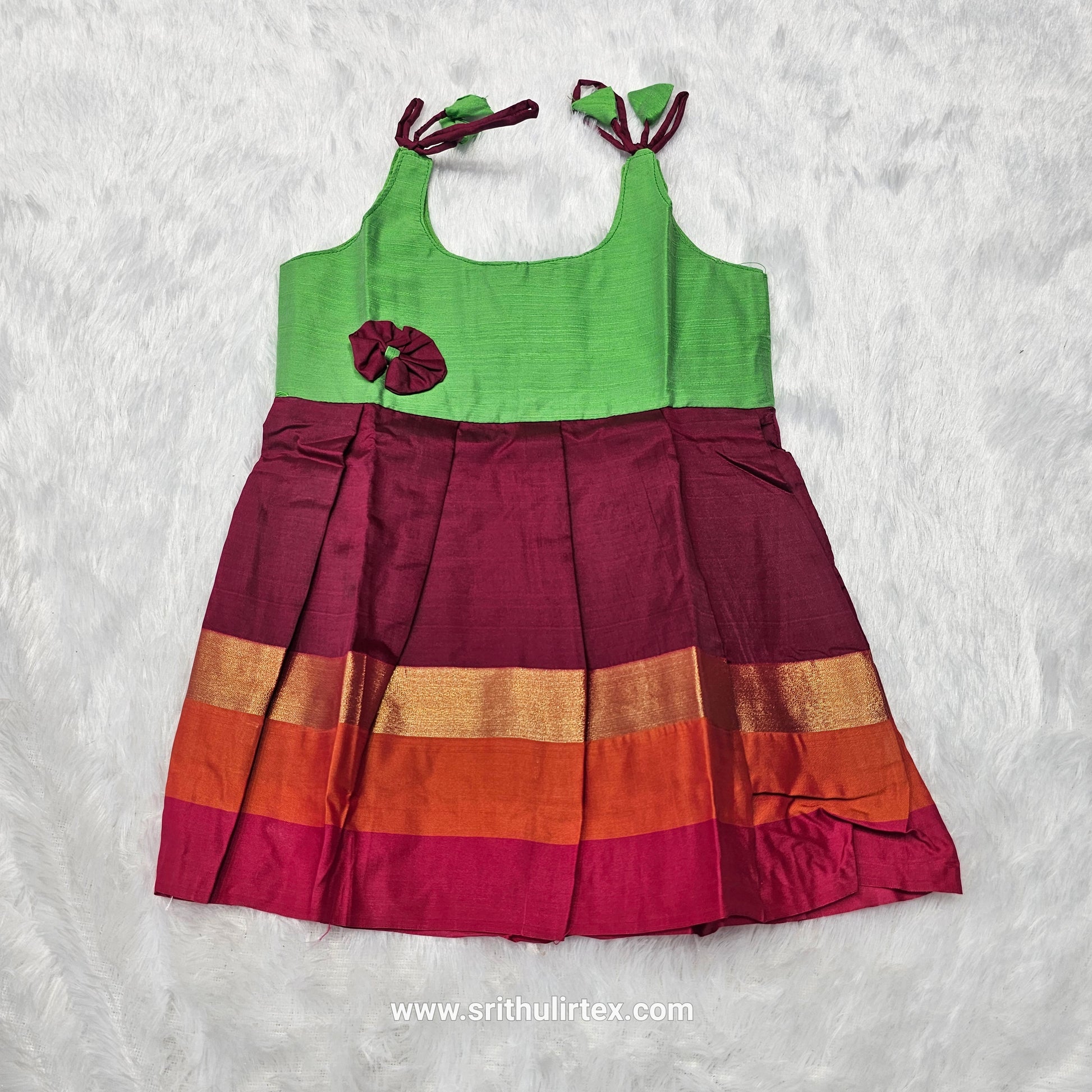 Pink top with green multicolour border silk baby frock by Sri Thulir Tex