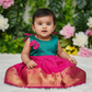 Pink top and green bridal silk baby frock with zari border by Sri Thulir Tex