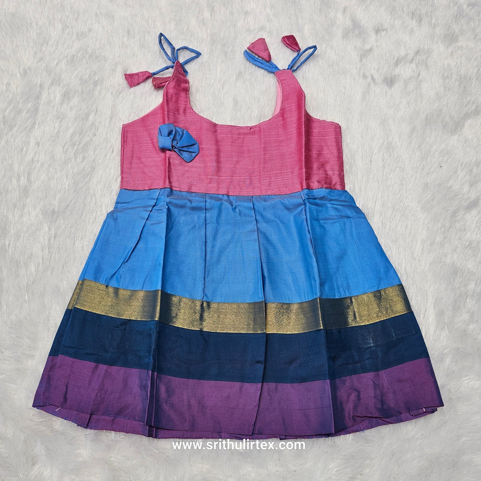 Pink top with teal and multicolour border silk baby frock by Sri Thulir Tex