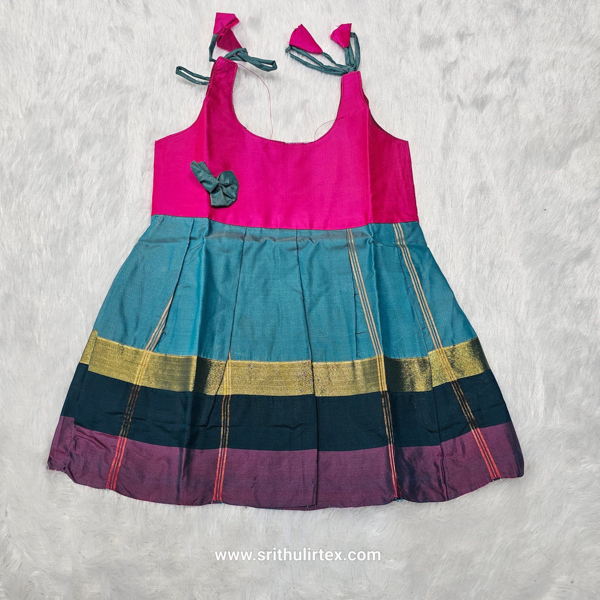 Pink top with teal and multicolour border silk baby frock by Sri Thulir Tex