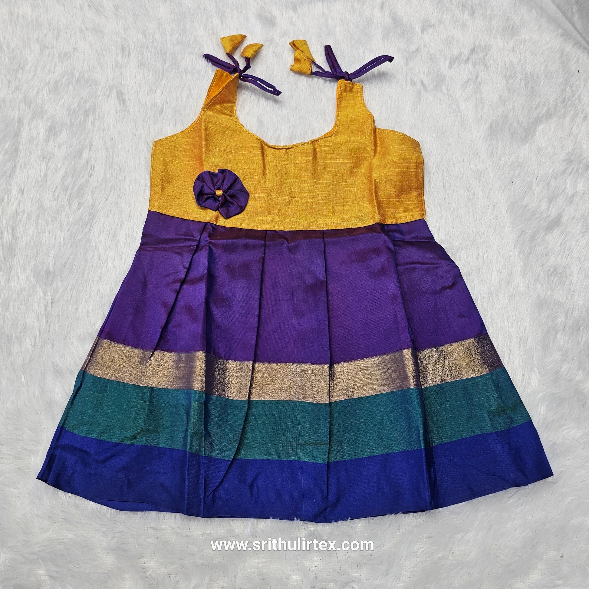 Pink top with teal and multicolour border silk baby frock by Sri Thulir Tex