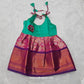 Baby silk frock with purple semi silk top and gold bridal silk skirt by Sri Thulir Tex