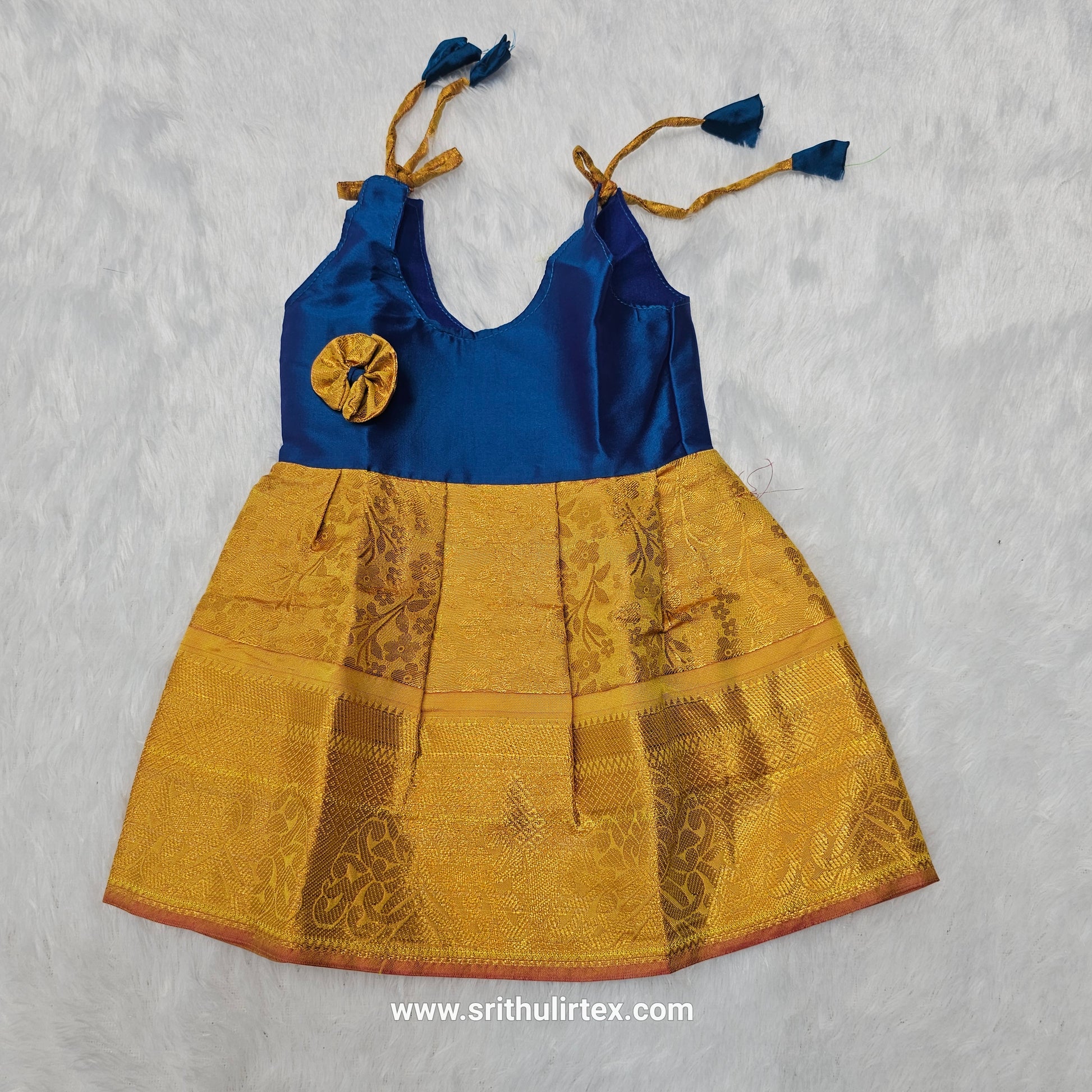 Baby silk frock with purple semi silk top and gold bridal silk skirt by Sri Thulir Tex