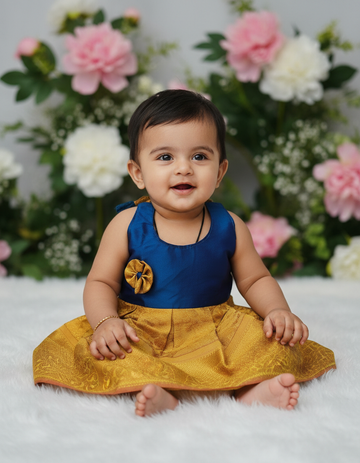 Baby silk frock with purple semi silk top and gold bridal silk skirt by Sri Thulir Tex