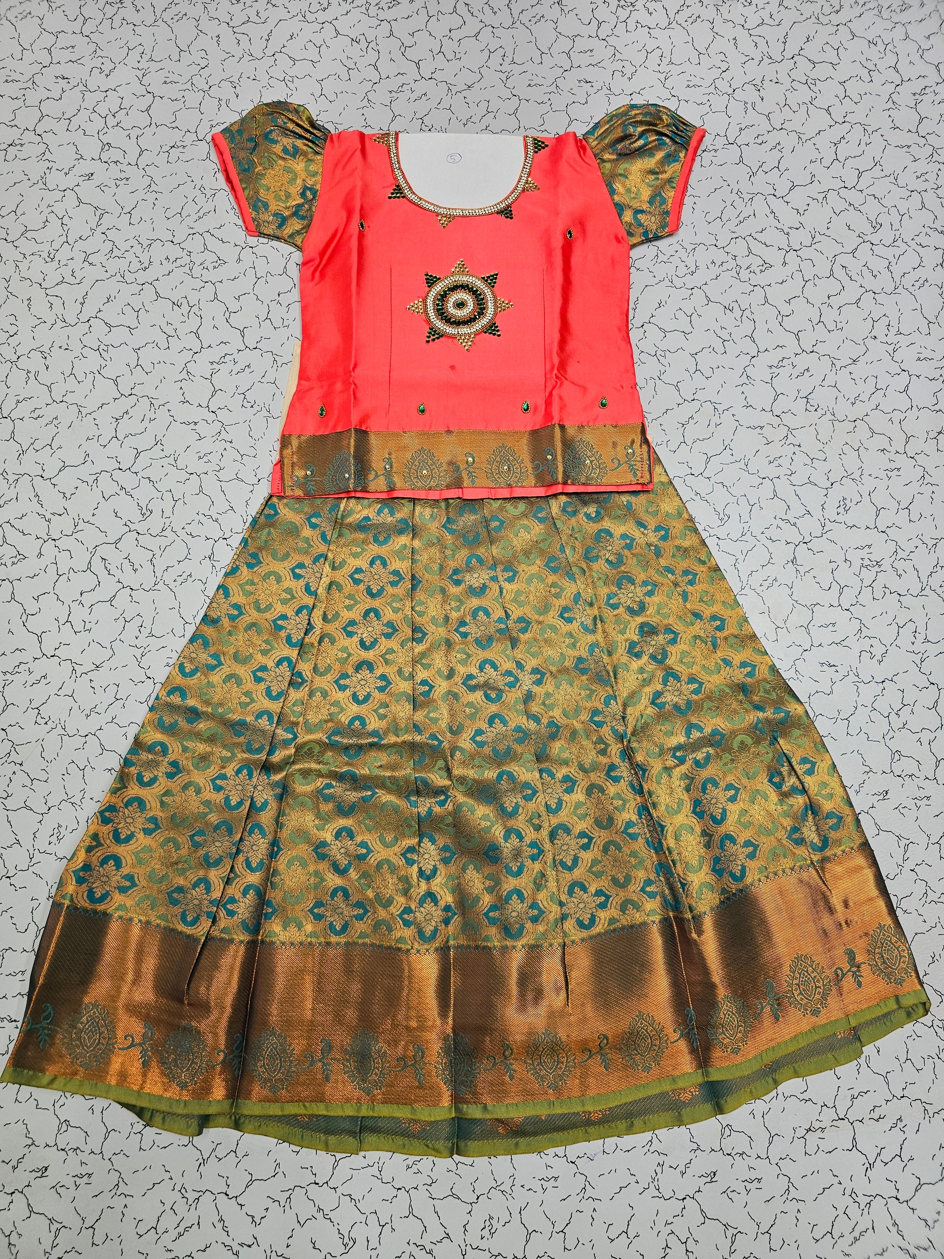 Coral pink and green silk pattu pavadai for girls with stone work blouse and zari bridal silk skirt – Sri Thulir Tex