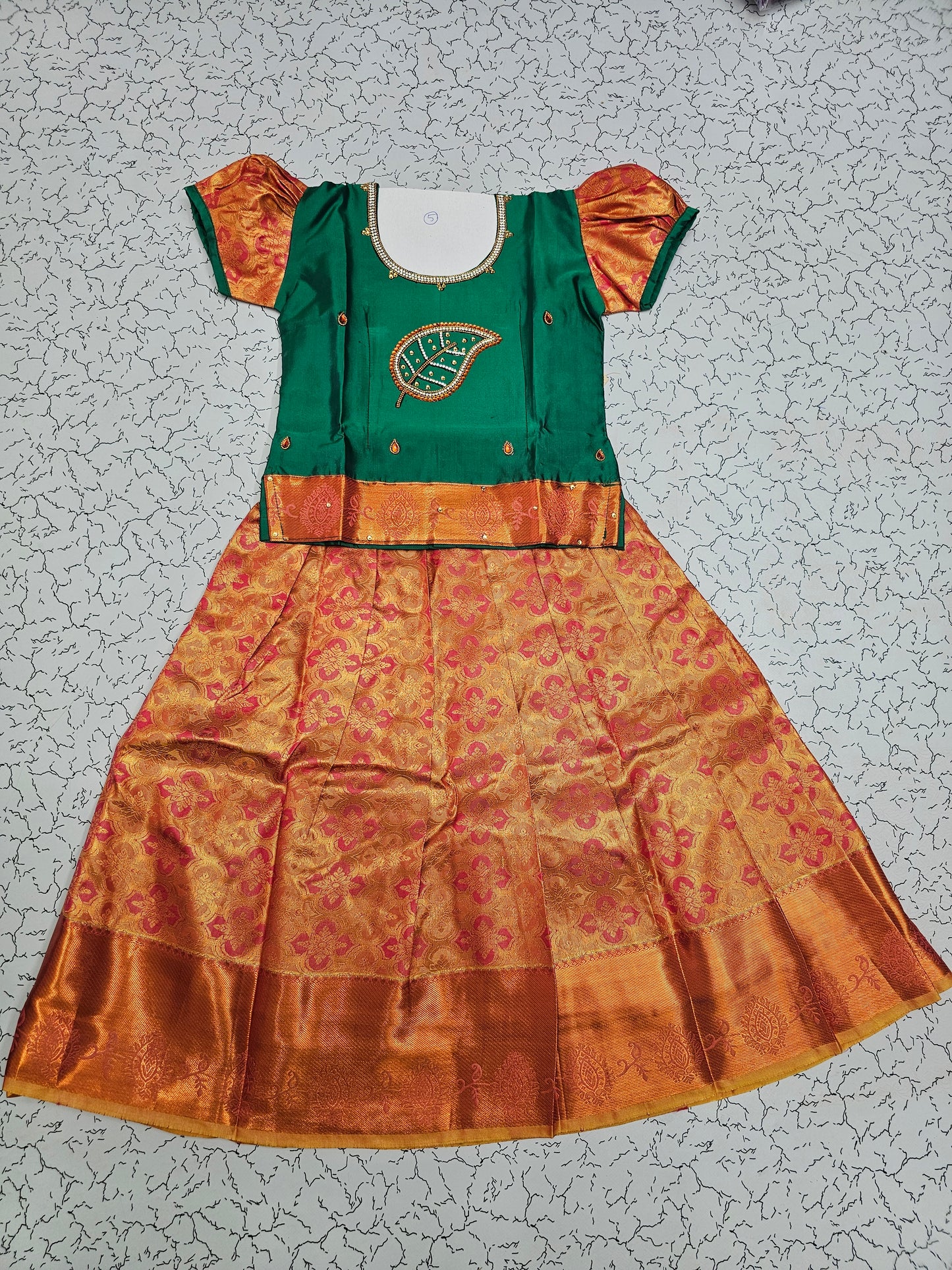 Emerald green and golden bridal silk pattu pavadai for kids with leaf embroidery and puff sleeves – Sri Thulir Tex South Indian traditional kids wear