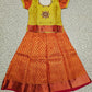 Golden yellow and red bridal silk pattu pavadai for kids with puff sleeves and stone embroidery – Sri Thulir Tex South Indian traditional kids wear