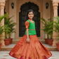 Green and copper kids pattu pavadai set with puff sleeves and bridal silk skirt by Sri Thulir Tex
