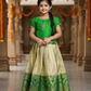 Green and golden Banarasi semi silk pattu pavadai for girls with puff sleeve and rich zari border – Sri Thulir
