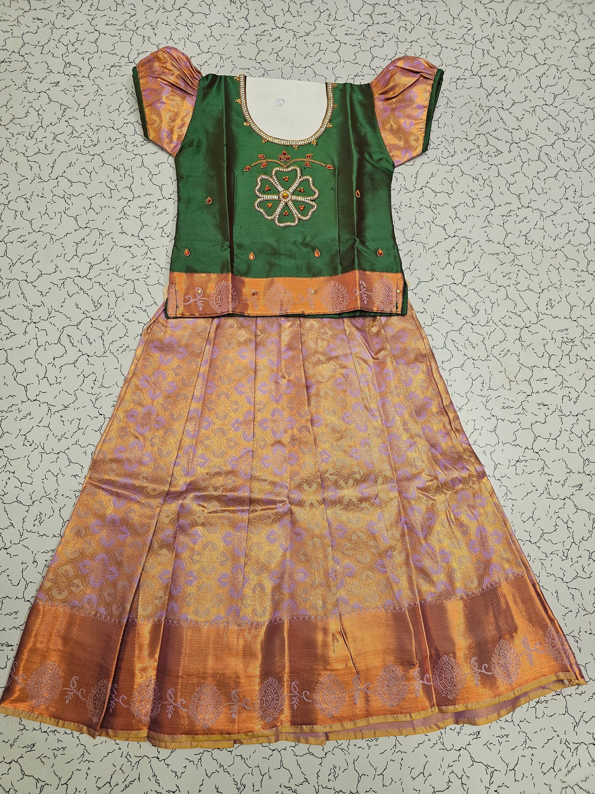 Green and lavender silk pattu pavadai for girls with designer stone work blouse and zari border skirt – Sri Thulir Tex