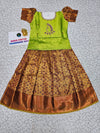 Green and maroon kids pattu pavadai set with puff sleeves and bridal silk skirt by Sri Thulir Tex