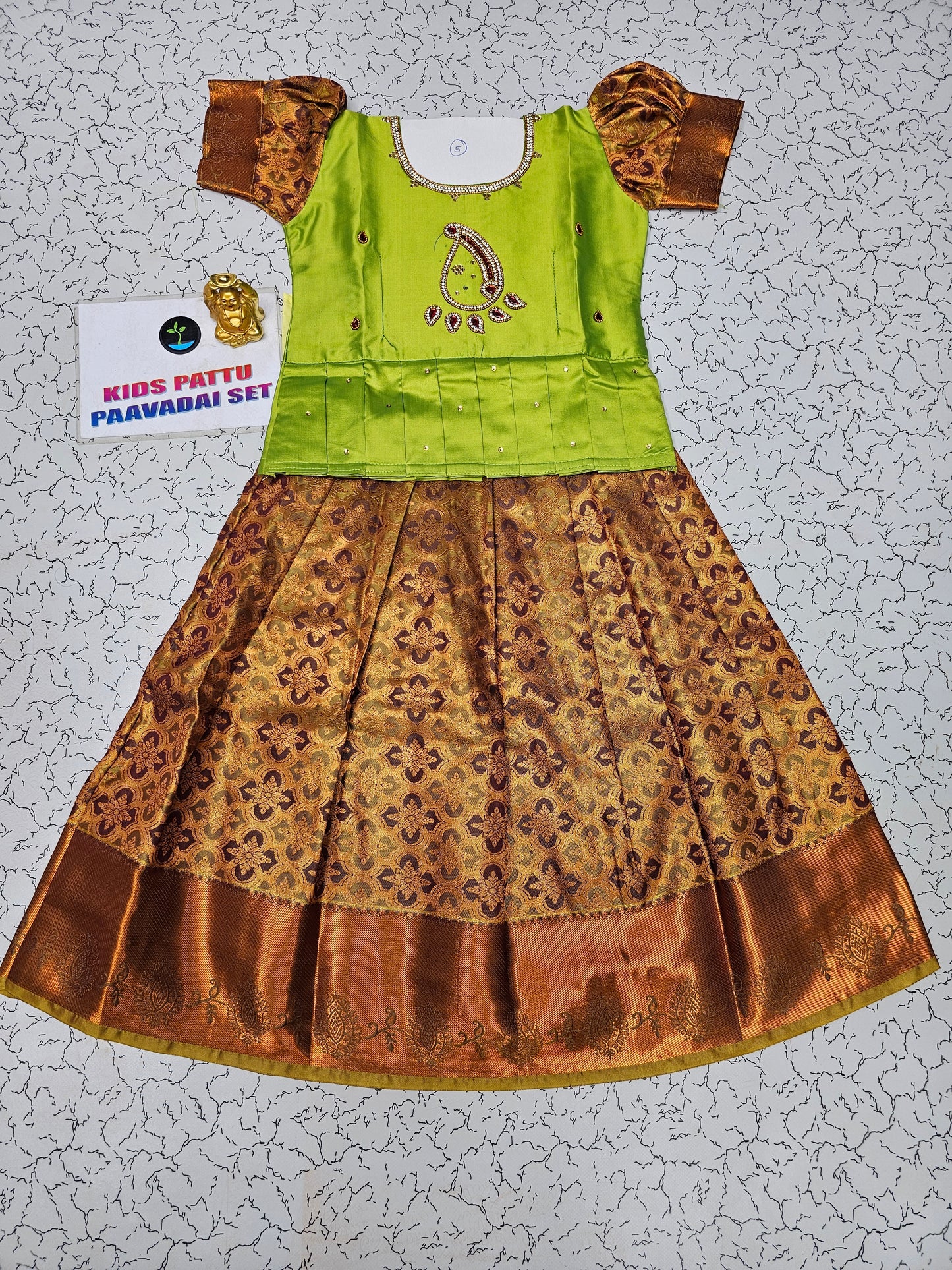 Green and maroon kids pattu pavadai set with puff sleeves and bridal silk skirt by Sri Thulir Tex
