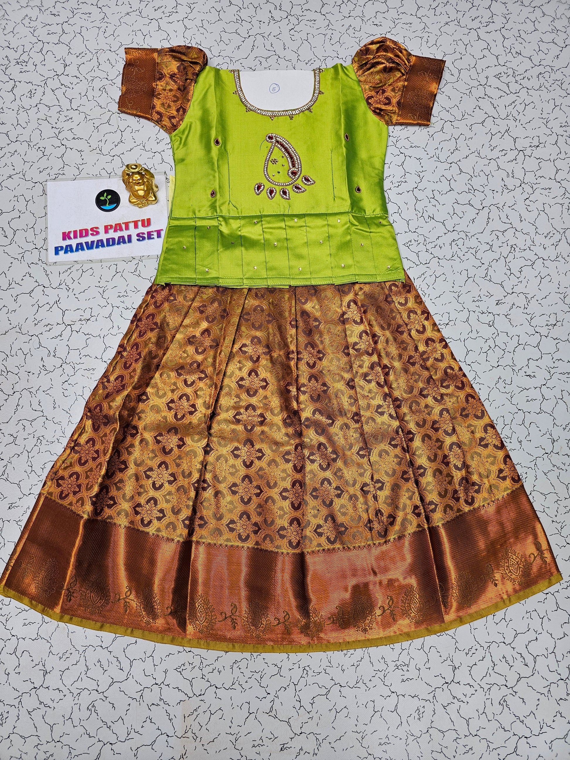 Green and maroon kids pattu pavadai set with puff sleeves and bridal silk skirt by Sri Thulir Tex