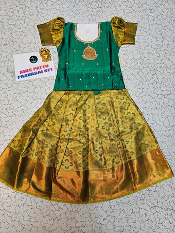 Green and mustard kids pattu pavadai set with puff sleeves and bridal silk skirt by Sri Thulir Tex