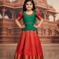 Green and red kids pattu pavadai set with puff sleeves and premium bridal silk skirt by Sri Thulir Tex