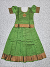 Green semi silk pattu pavadai for girls with puff sleeves and gold zari border – Sri Thulir Tex