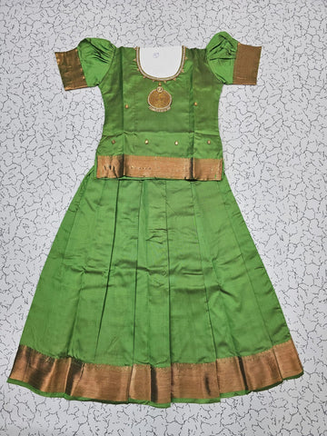 Green semi silk pattu pavadai for girls with puff sleeves and gold zari border – Sri Thulir Tex
