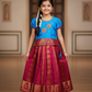 Kids Pattu Pavadai set with blue stone-work top and maroon zari woven skirt from Sri Thulir Tex.