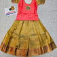 Kids pattu pavadai set with coral pink top and gold bridal silk skirt from Sri Thulir Tex