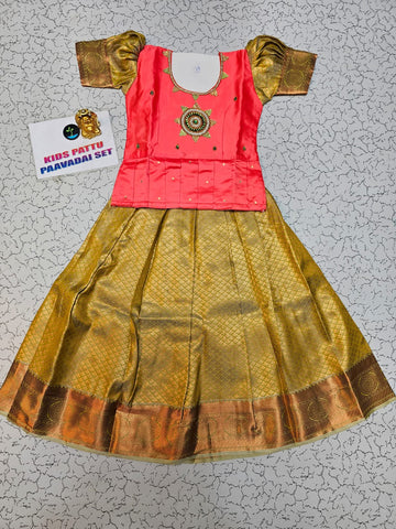 Kids pattu pavadai set with coral pink top and gold bridal silk skirt from Sri Thulir Tex